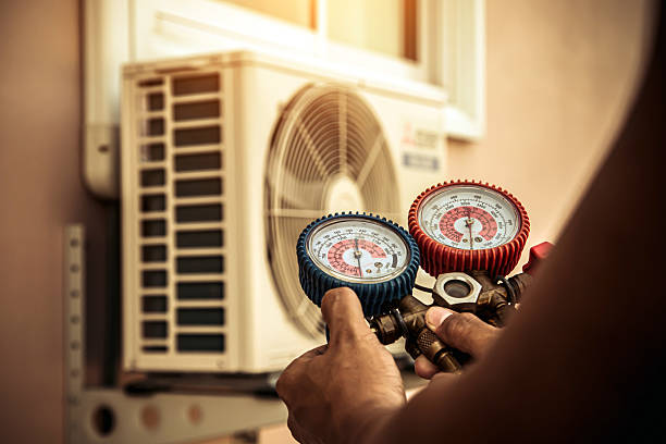 Professional Air Conditioning Service technician working in Madison, AL